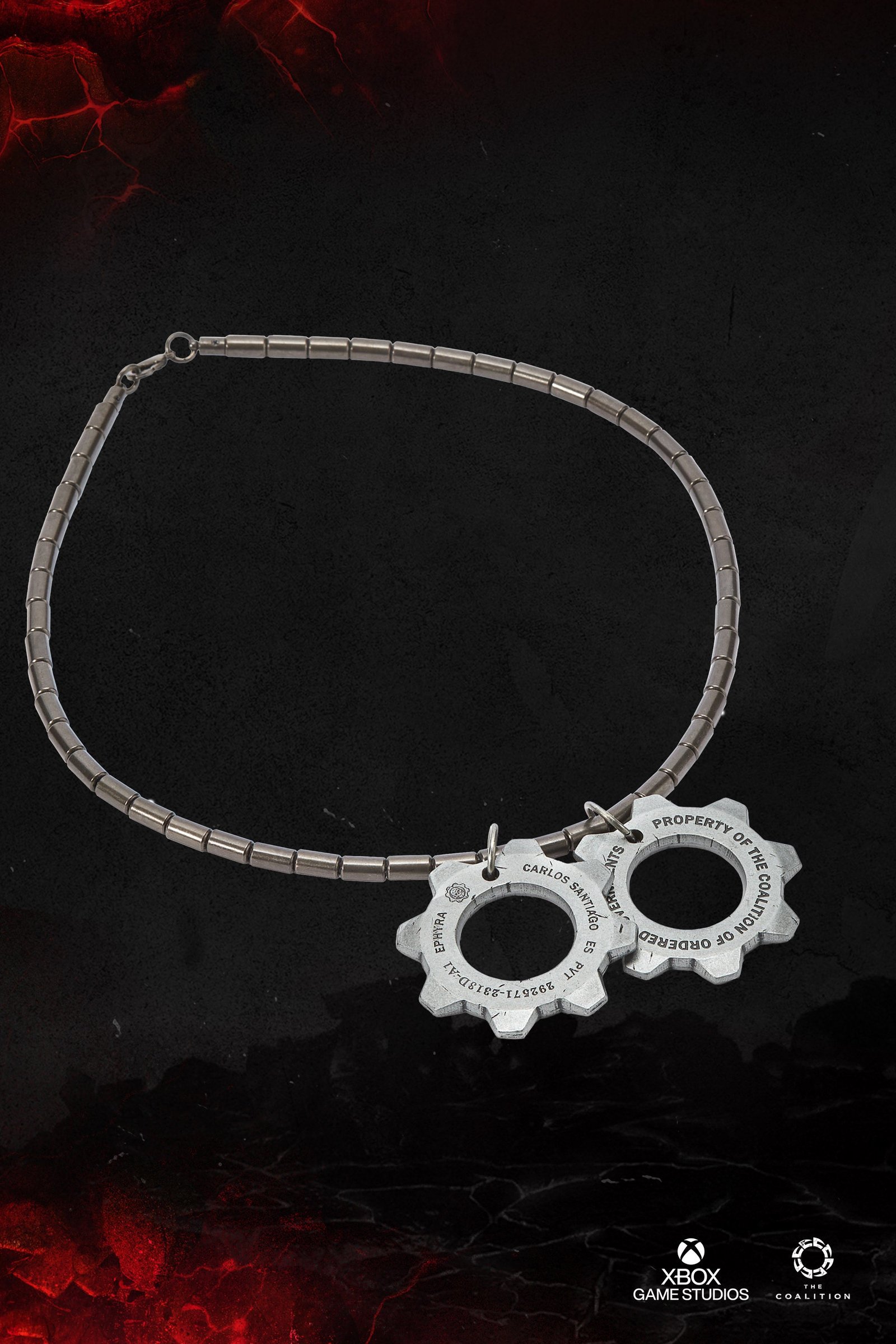 Gears of War E-Day Collector's Edition - close-up of the metal replica COG tags - fivestaredition.com